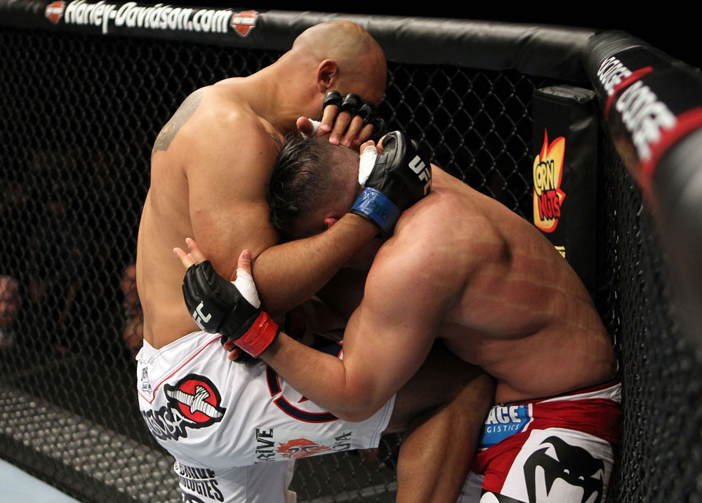 EAST RUTHERFORD, NJ - MAY 05: Lavar Johnson (L) knees Pat Barry (R) during thier Heavyweight bout at Izod Center on May 5, 2012 in East Rutherford, New Jersey. (Photo by Josh Hedges/Zuffa LLC/Zuffa LLC via Getty Images)