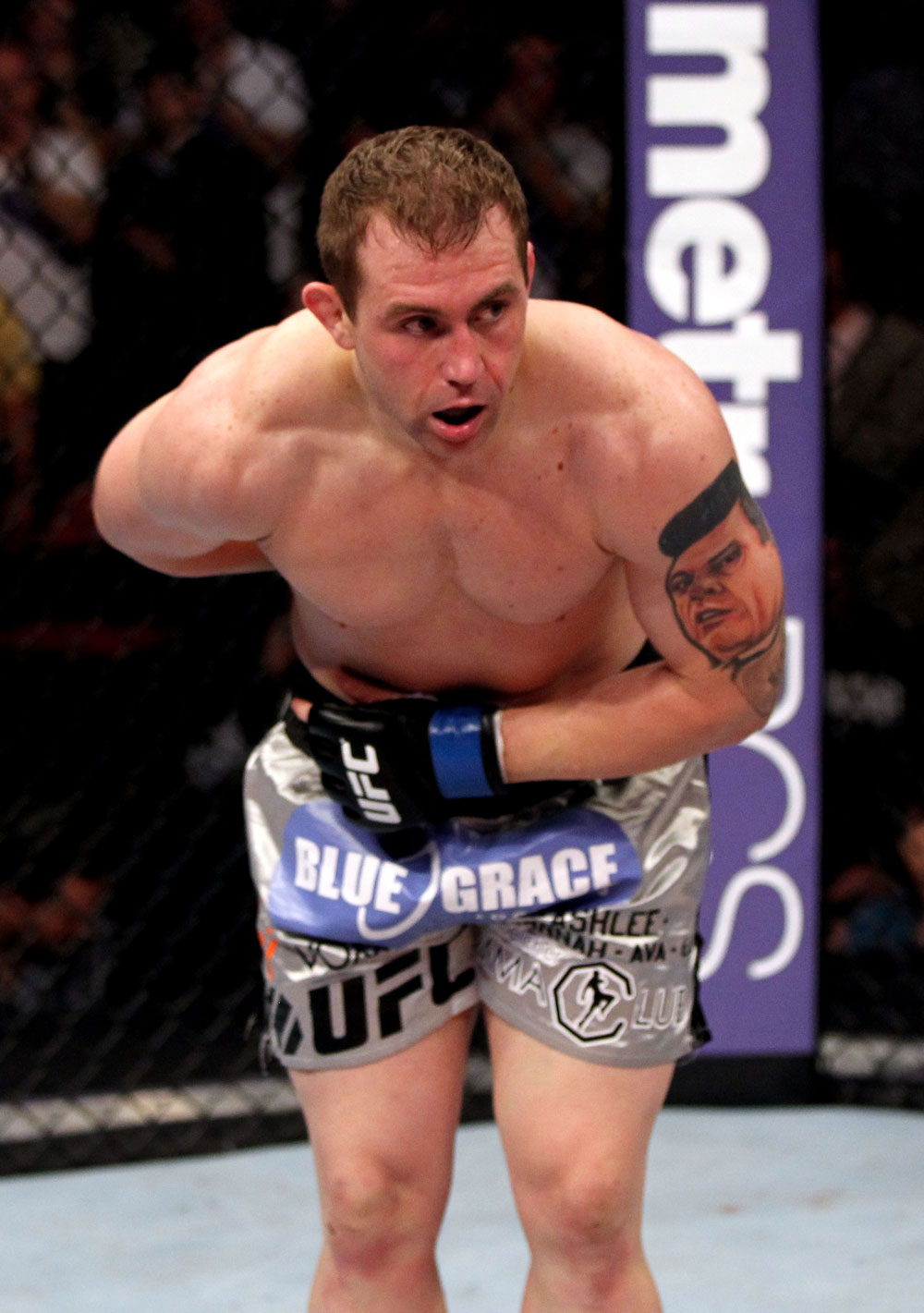 EAST RUTHERFORD, NJ - MAY 05: Alan Belcher bows to the crowd after defeating Rousimar Palhares in thier Middleweight bout at Izod Center on May 5, 2012 in East Rutherford, New Jersey. (Photo by Josh Hedges/Zuffa LLC/Zuffa LLC via Getty Images)