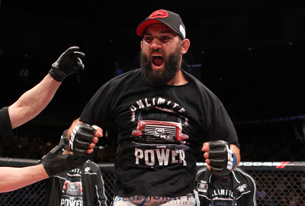 EAST RUTHERFORD, NJ - MAY 05: Johny Hendricks celebrates after defeating Josh Koscheck in thier Welterweight bout at Izod Center on May 5, 2012 in East Rutherford, New Jersey. (Photo by Josh Hedges/Zuffa LLC/Zuffa LLC via Getty Images)