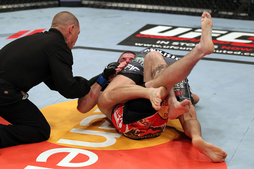 EAST RUTHERFORD, NJ - MAY 05: Nate Diaz Takes down Jim Miller during thier Lightweight bout at Izod Center on May 5, 2012 in East Rutherford, New Jersey. (Photo by Josh Hedges/Zuffa LLC/Zuffa LLC via Getty Images)