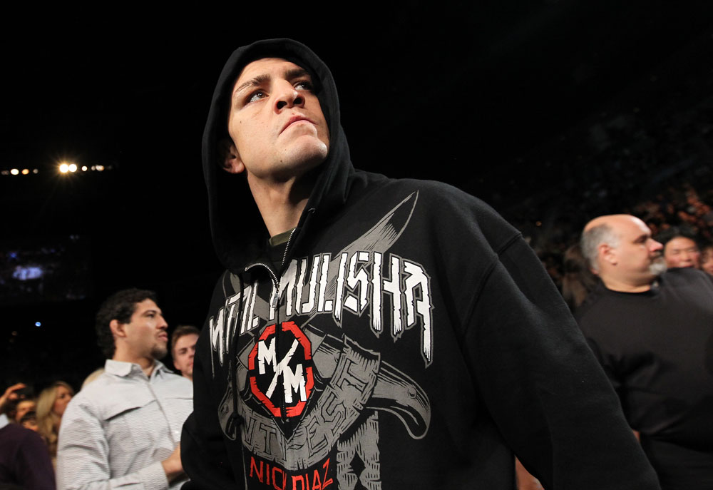 LAS VEGAS - FEBRUARY 04:  Nick Diaz makes his way to the Octagon for his fight with Carlos Condit during the UFC 143 event at Mandalay Bay Events Center on February 4, 2012 in Las Vegas, Nevada.  (Photo by Nick Laham/Zuffa LLC/Zuffa LLC via Getty Images) *** Local Caption *** Nick Diaz