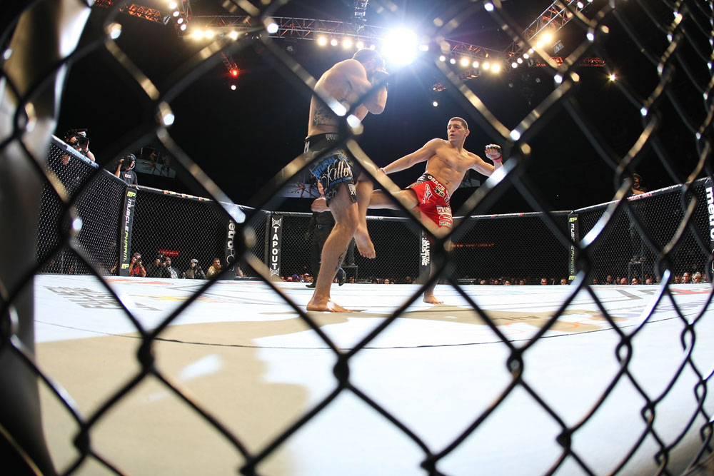 LAS VEGAS - FEBRUARY 04:  (R-L) Nick Diaz kicks Carlos Condit during the UFC 143 event at Mandalay Bay Events Center on February 4, 2012 in Las Vegas, Nevada.  (Photo by Nick Laham/Zuffa LLC/Zuffa LLC via Getty Images) *** Local Caption *** Nick Diaz; Carlos Condit