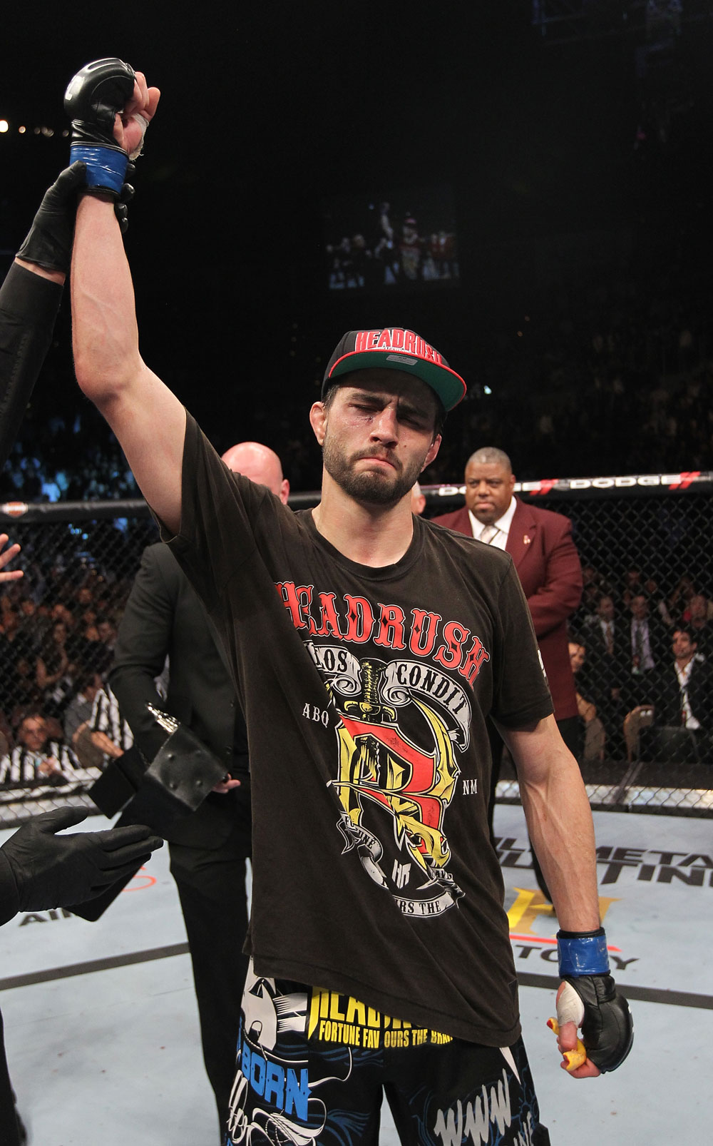 LAS VEGAS - FEBRUARY 04:  Carlos Condit is declared the winner in his fight with Nick Diaz during the UFC 143 event at Mandalay Bay Events Center on February 4, 2012 in Las Vegas, Nevada.  (Photo by Nick Laham/Zuffa LLC/Zuffa LLC via Getty Images) *** Local Caption *** Carlos Condit