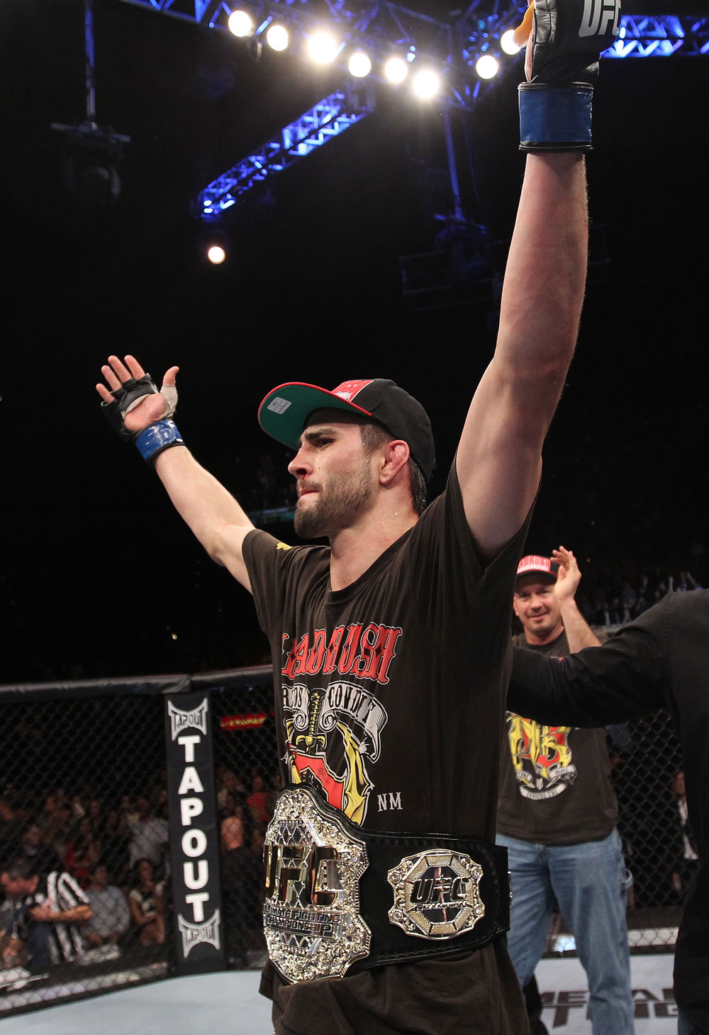 LAS VEGAS - FEBRUARY 04:  Carlos Condit celebrates his win over Nick Diaz during the UFC 143 event at Mandalay Bay Events Center on February 4, 2012 in Las Vegas, Nevada.  (Photo by Nick Laham/Zuffa LLC/Zuffa LLC via Getty Images) *** Local Caption *** Carlos Condit