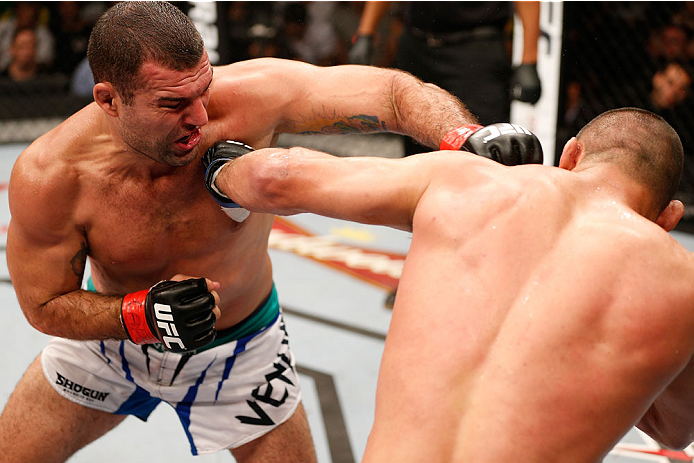 Mauricio Rua & Dan Henderson trade punches in their bout during the UFC Fight Night event on March 23, 2014 in Natal, Brazil. (Photo by Josh Hedges/Zuffa LLC)