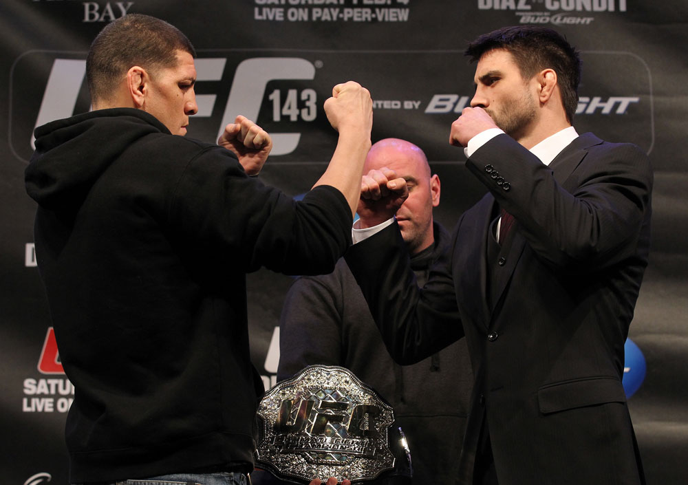 LAS VEGAS, NV - FEBRUARY 02:  (L-R) Opponents Nick Diaz and Carlos Condit face off during the UFC 143 final pre-fight press conference at the Mandalay Bay Hotel & Casino on February 2, 2012 in Las Vegas, United States.  (Photo by Josh Hedges/Zuffa LLC/Zuffa LLC via Getty Images) *** Local Caption *** Nick Diaz; Carlos Condit