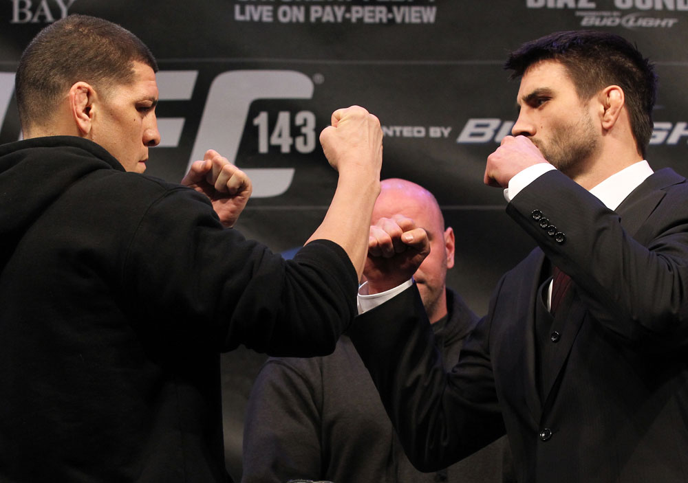 LAS VEGAS, NV - FEBRUARY 02: (L-R) Opponents Nick Diaz and Carlos Condit face off during the UFC 143 final pre-fight press conference at the Mandalay Bay Hotel & Casino on February 2, 2012 in Las Vegas, United States. (Photo by Josh Hedges/Zuffa LLC/Zuffa LLC via Getty Images) *** Local Caption *** Nick Diaz; Carlos Condit