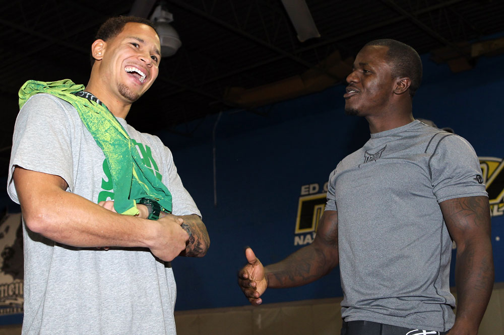 NASHVILLE, TN - JANUARY 18: (L-R) Tennessee Titans defensive back Cortland Finnegan meets UFC fighter Melvin Guillard during the UFC on FX open workouts at the Nashville MMA Gym on January 18, 2012 in Nashville, Tennessee. (Photo by Josh Hedges/Zuffa LLC/Zuffa LLC via Getty Images)