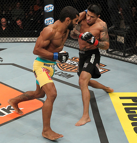 LAS VEGAS, NV - DECEMBER 15: (L-R) Hugo Viana punches Reuben Duran during their bantamweight fight at the TUF 16 Finale on December 15, 2012 at the Joint at the Hard Rock in Las Vegas, Nevada. (Photo by Jim Kemper/Zuffa LLC/Zuffa LLC via Getty Images) *** Local Caption *** Hugo Viana; Reuben Duran