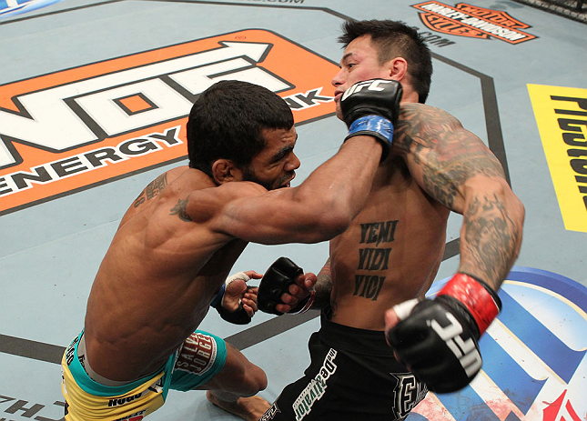LAS VEGAS, NV - DECEMBER 15: (L-R) Hugo Viana punches Reuben Duran during their bantamweight fight at the TUF 16 Finale on December 15, 2012 at the Joint at the Hard Rock in Las Vegas, Nevada. (Photo by Jim Kemper/Zuffa LLC/Zuffa LLC via Getty Images) *** Local Caption *** Hugo Viana; Reuben Duran