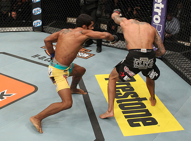 LAS VEGAS, NV - DECEMBER 15: (L-R) Hugo Viana punches Reuben Duran during their bantamweight fight at the TUF 16 Finale on December 15, 2012 at the Joint at the Hard Rock in Las Vegas, Nevada. (Photo by Jim Kemper/Zuffa LLC/Zuffa LLC via Getty Images) *** Local Caption *** Hugo Viana; Reuben Duran