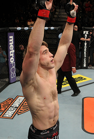 LAS VEGAS, NV - DECEMBER 15: T.J. Waldburger reacts to his submission victory over Nick Catone after their welterweight fight at the TUF 16 Finale on December 15, 2012 at the Joint at the Hard Rock in Las Vegas, Nevada. (Photo by Jim Kemper/Zuffa LLC/Zuffa LLC via Getty Images) *** Local Caption *** T.J. Waldburger; Nick Catone