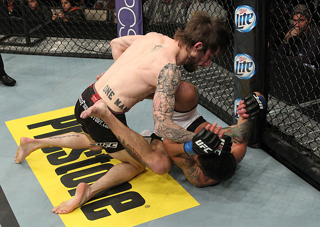 LAS VEGAS, NV - DECEMBER 15: (L-R) Johnny Bedford punches Marcos Vinicius during their bantamweight fight at the TUF 16 Finale on December 15, 2012 at the Joint at the Hard Rock in Las Vegas, Nevada. (Photo by Jim Kemper/Zuffa LLC/Zuffa LLC via Getty Images) *** Local Caption *** Johny Bedford; Marcos Vinicius