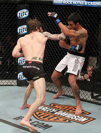 LAS VEGAS, NV - DECEMBER 15: (L-R) Johnny Bedford punches Marcos Vinicius during their bantamweight fight at the TUF 16 Finale on December 15, 2012 at the Joint at the Hard Rock in Las Vegas, Nevada. (Photo by Jim Kemper/Zuffa LLC/Zuffa LLC via Getty Images) *** Local Caption *** Johny Bedford; Marcos Vinicius