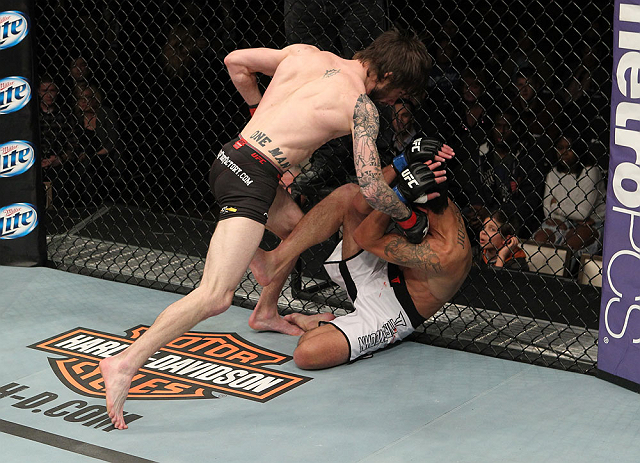 LAS VEGAS, NV - DECEMBER 15: (L-R) Johnny Bedford punches Marcos Vinicius during their bantamweight fight at the TUF 16 Finale on December 15, 2012 at the Joint at the Hard Rock in Las Vegas, Nevada. (Photo by Jim Kemper/Zuffa LLC/Zuffa LLC via Getty Images) *** Local Caption *** Johny Bedford; Marcos Vinicius