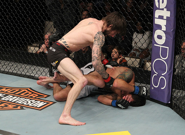 LAS VEGAS, NV - DECEMBER 15: (L-R) Johnny Bedford punches Marcos Vinicius during their bantamweight fight at the TUF 16 Finale on December 15, 2012 at the Joint at the Hard Rock in Las Vegas, Nevada. (Photo by Jim Kemper/Zuffa LLC/Zuffa LLC via Getty Images) *** Local Caption *** Johny Bedford; Marcos Vinicius