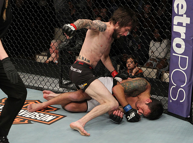 LAS VEGAS, NV - DECEMBER 15: (L-R) Johnny Bedford punches Marcos Vinicius during their bantamweight fight at the TUF 16 Finale on December 15, 2012 at the Joint at the Hard Rock in Las Vegas, Nevada. (Photo by Jim Kemper/Zuffa LLC/Zuffa LLC via Getty Images) *** Local Caption *** Johny Bedford; Marcos Vinicius