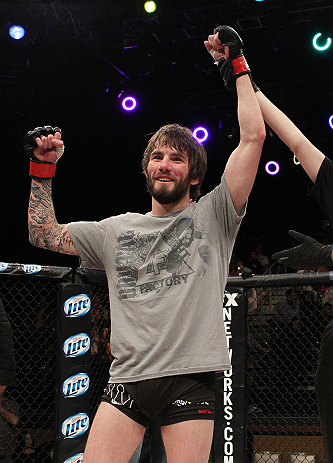 LAS VEGAS, NV - DECEMBER 15: Johnny Bedford reacts to being declared the winner in his fight against Marcos Vinicius after their bantamweight fight at the TUF 16 Finale on December 15, 2012 at the Joint at the Hard Rock in Las Vegas, Nevada. (Photo by Jim Kemper/Zuffa LLC/Zuffa LLC via Getty Images) *** Local Caption *** Johny Bedford; Marcos Vinicius