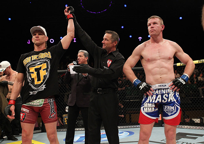 LAS VEGAS, NV - DECEMBER 15: Mike Pyle (left) reacts to being declared the winner in his knockout victory over James Head (right) by referee Steve Mazzagatti during their welterweight fight at the TUF 16 Finale on December 15, 2012 at the Joint at the Hard Rock in Las Vegas, Nevada. (Photo by Jim Kemper/Zuffa LLC/Zuffa LLC via Getty Images) *** Local Caption *** Mike Pyle; James Head; Steve Mazzagatti
