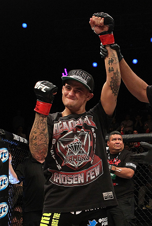LAS VEGAS, NV - DECEMBER 15:  Dustin Poirier reacts to being declared the winner in his fight against Jonathan Brookins during their featherweight fight at the TUF 16 Finale on December 15, 2012  at the Joint at the Hard Rock in Las Vegas, Nevada.  (Photo by Jim Kemper/Zuffa LLC/Zuffa LLC via Getty Images) *** Local Caption *** Dustn Poirier; Jonathan Brookins