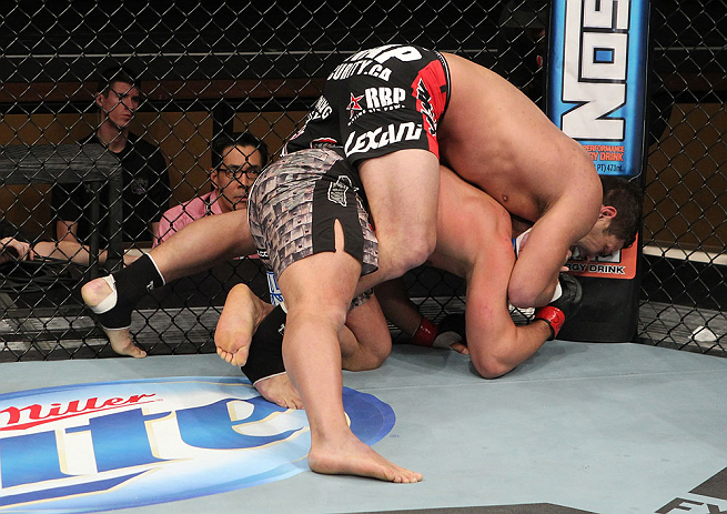LAS VEGAS, NV - DECEMBER 15: Shane Del Rosario (top) attempts to submit Pat Barry (bottom) during their heavyweight fight at the TUF 16 Finale on December 15, 2012 at the Joint at the Hard Rock in Las Vegas, Nevada. (Photo by Jim Kemper/Zuffa LLC/Zuffa LLC via Getty Images) *** Local Caption *** Pat Barry; Shane Del Rosario