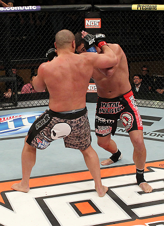 LAS VEGAS, NV - DECEMBER 15: (L-R) Pat Barry punches Shane Del Rosario during their heavyweight fight at the TUF 16 Finale on December 15, 2012 at the Joint at the Hard Rock in Las Vegas, Nevada. (Photo by Jim Kemper/Zuffa LLC/Zuffa LLC via Getty Images) *** Local Caption *** Pat Barry; Shane Del Rosario