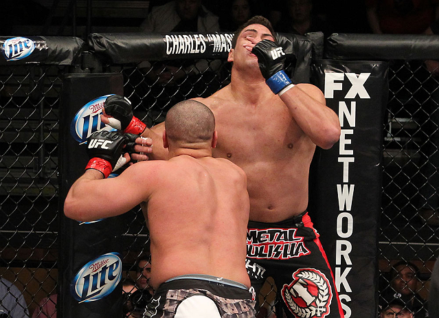 LAS VEGAS, NV - DECEMBER 15: (L-R) Pat Barry punches Shane Del Rosario during their heavyweight fight at the TUF 16 Finale on December 15, 2012 at the Joint at the Hard Rock in Las Vegas, Nevada. (Photo by Jim Kemper/Zuffa LLC/Zuffa LLC via Getty Images) *** Local Caption *** Pat Barry; Shane Del Rosario