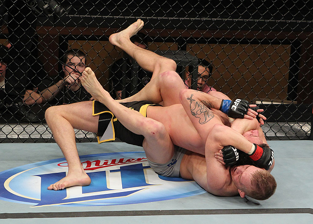 LAS VEGAS, NV - DECEMBER 15: Colton Smith (bottom) attempts to submit Mike Ricci during their lightweight fight at the TUF 16 Finale on December 15, 2012 at the Joint at the Hard Rock in Las Vegas, Nevada. (Photo by Jim Kemper/Zuffa LLC/Zuffa LLC via Getty Images) *** Local Caption *** Colton Smith; Mike Ricci
