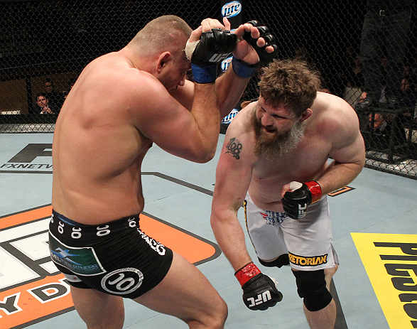 LAS VEGAS, NV - DECEMBER 15: (R-L) Roy Nelson punches Matt Mitrione during their heavyweight fight at the TUF 16 Finale on December 15, 2012 at the Joint at the Hard Rock in Las Vegas, Nevada. (Photo by Jim Kemper/Zuffa LLC/Zuffa LLC via Getty Images) *** Local Caption *** Roy Nelson; Matt Mitrione