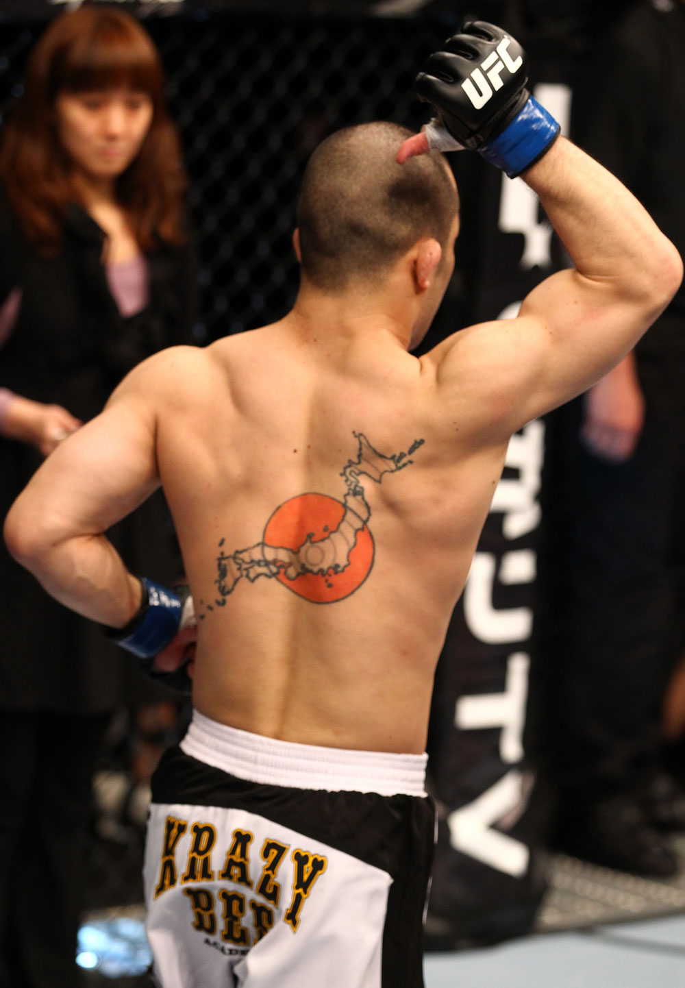 SAITAMA, JAPAN - FEBRUARY 26:  Issei Tamura reacts after knocking out Tiequan Zhang during the UFC 144 event at Saitama Super Arena on February 26, 2012 in Saitama, Japan.  (Photo by Al Bello/Zuffa LLC/Zuffa LLC via Getty Images) *** Local Caption *** Issei Tamura