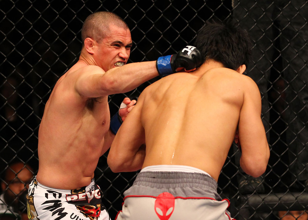 SAITAMA, JAPAN - FEBRUARY 26:  (L-R) Chris Cariaso punches Takeya Mizugaki during the UFC 144 event at Saitama Super Arena on February 26, 2012 in Saitama, Japan.  (Photo by Al Bello/Zuffa LLC/Zuffa LLC via Getty Images) *** Local Caption *** Takeya Mizugaki; Chris Cariaso