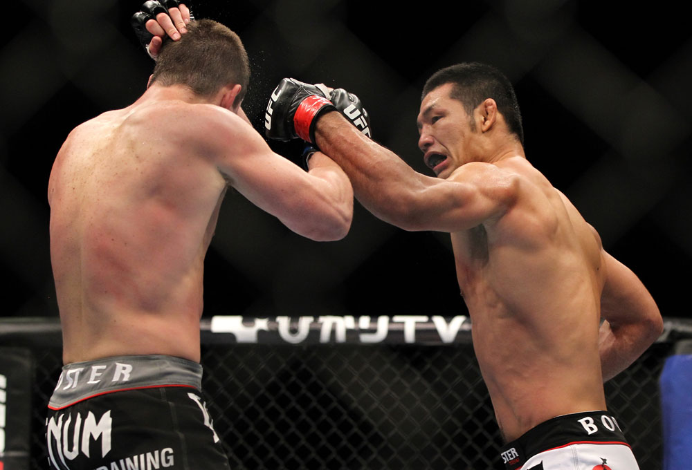 SAITAMA, JAPAN - FEBRUARY 26:  (R-L) RIki Fukuda punches Steve Cantwell during the UFC 144 event at Saitama Super Arena on February 26, 2012 in Saitama, Japan.  (Photo by Josh Hedges/Zuffa LLC/Zuffa LLC via Getty Images) *** Local Caption *** Riki Fukuda; Steve Cantwell