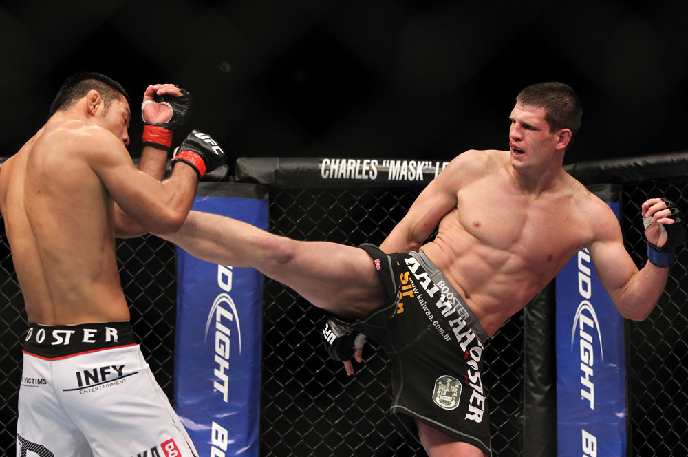 SAITAMA, JAPAN - FEBRUARY 26:  (R-L) Steve Cantwell kicks Riki Fukuda during the UFC 144 event at Saitama Super Arena on February 26, 2012 in Saitama, Japan.  (Photo by Josh Hedges/Zuffa LLC/Zuffa LLC via Getty Images) *** Local Caption *** Riki Fukuda; Steve Cantwell
