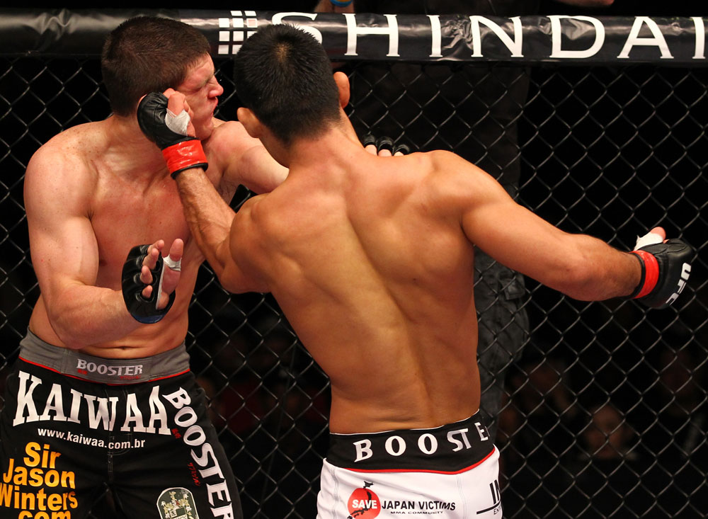 SAITAMA, JAPAN - FEBRUARY 26:  (R-L) RIki Fukuda punches Steve Cantwell during the UFC 144 event at Saitama Super Arena on February 26, 2012 in Saitama, Japan.  (Photo by Al Bello/Zuffa LLC/Zuffa LLC via Getty Images) *** Local Caption *** Riki Fukuda; Steve Cantwell