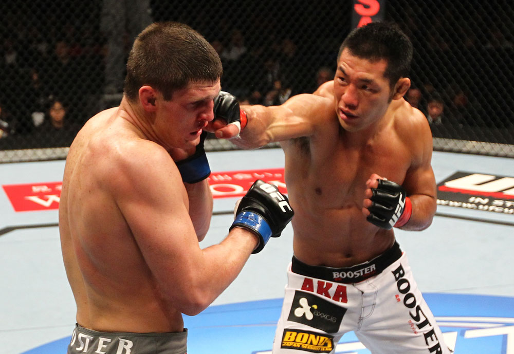 SAITAMA, JAPAN - FEBRUARY 26:  (R-L) RIki Fukuda punches Steve Cantwell during the UFC 144 event at Saitama Super Arena on February 26, 2012 in Saitama, Japan.  (Photo by Al Bello/Zuffa LLC/Zuffa LLC via Getty Images) *** Local Caption *** Riki Fukuda; Steve Cantwell