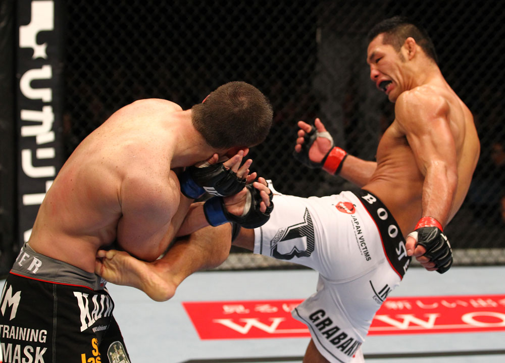 SAITAMA, JAPAN - FEBRUARY 26:  (R-L) RIki Fukuda kicks Steve Cantwell during the UFC 144 event at Saitama Super Arena on February 26, 2012 in Saitama, Japan.  (Photo by Al Bello/Zuffa LLC/Zuffa LLC via Getty Images) *** Local Caption *** Riki Fukuda; Steve Cantwell