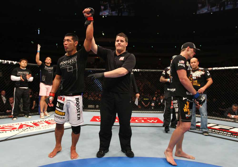 SAITAMA, JAPAN - FEBRUARY 26:  Riki Fukuda (L) reacts after defeating Steve Cantwell (R) by decision during the UFC 144 event at Saitama Super Arena on February 26, 2012 in Saitama, Japan.  (Photo by Al Bello/Zuffa LLC/Zuffa LLC via Getty Images) *** Local Caption *** Riki Fukuda; Steve Cantwell