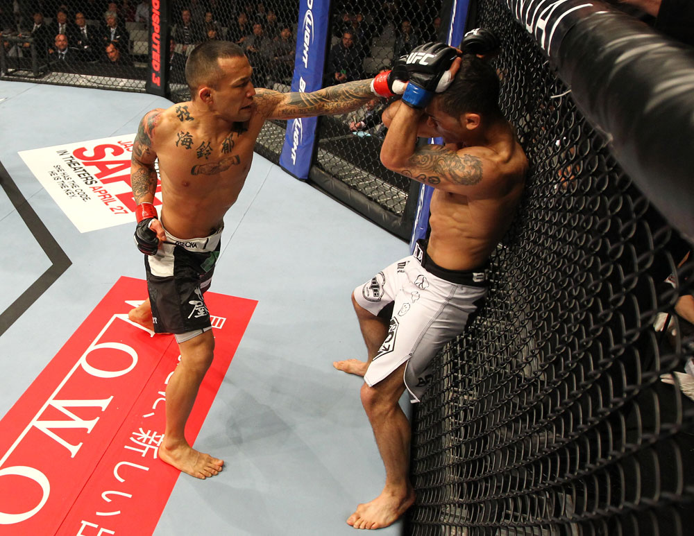 SAITAMA, JAPAN - FEBRUARY 26:  (L-R) Norifumi "Kid" Yamamoto punches Vaughn Lee during the UFC 144 event at Saitama Super Arena on February 26, 2012 in Saitama, Japan.  (Photo by Al Bello/Zuffa LLC/Zuffa LLC via Getty Images) *** Local Caption *** Norifumi Yamamoto; Vaughn Lee