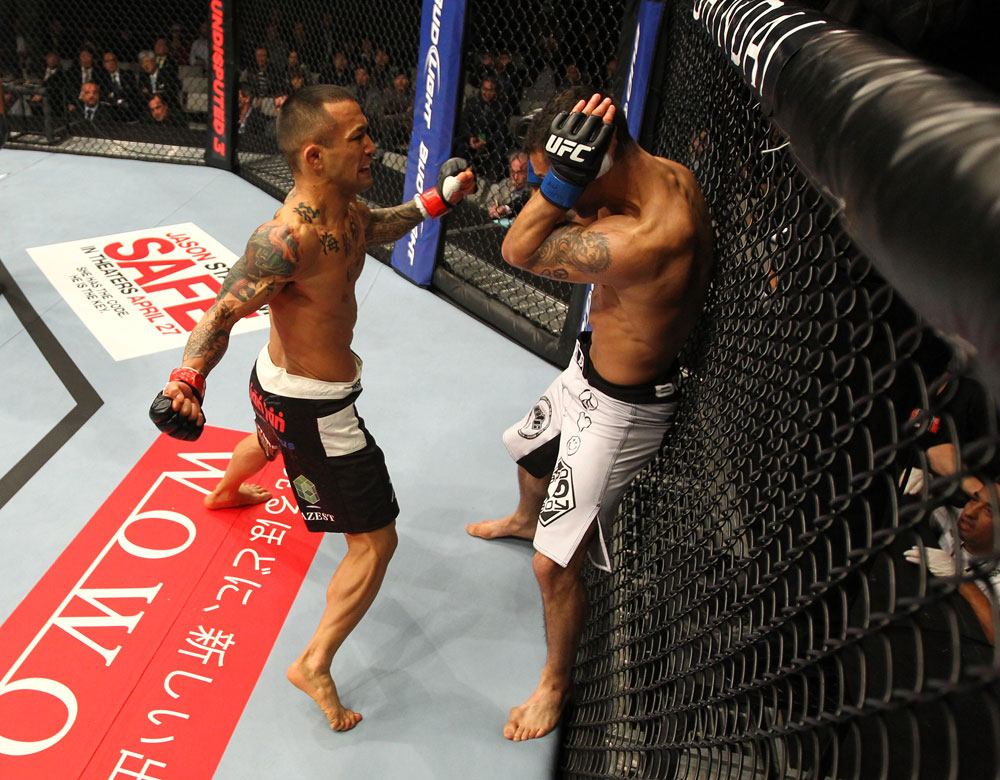 SAITAMA, JAPAN - FEBRUARY 26:  (L-R) Norifumi "Kid" Yamamoto punches Vaughn Lee during the UFC 144 event at Saitama Super Arena on February 26, 2012 in Saitama, Japan.  (Photo by Al Bello/Zuffa LLC/Zuffa LLC via Getty Images) *** Local Caption *** Norifumi Yamamoto; Vaughn Lee