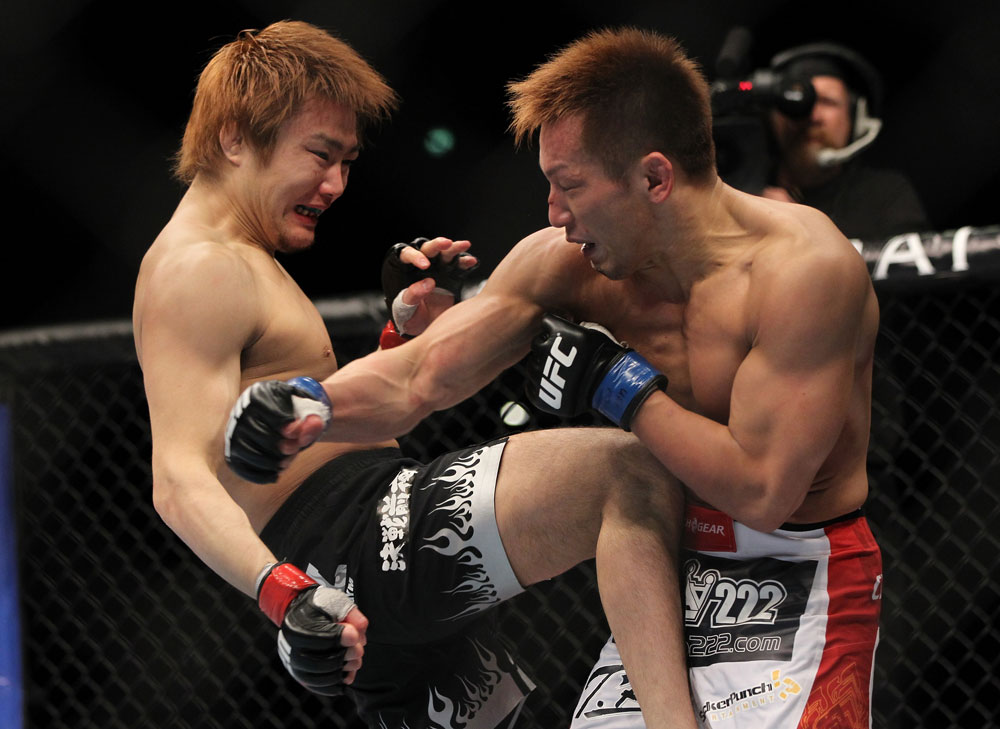 SAITAMA, JAPAN - FEBRUARY 26:  (L-R) Takanori Gomi delivers a knee strike against Eiji Mitsuoka during the UFC 144 event at Saitama Super Arena on February 26, 2012 in Saitama, Japan.  (Photo by Josh Hedges/Zuffa LLC/Zuffa LLC via Getty Images) *** Local Caption *** Takanori Gomi; Eiji Mitsuoka