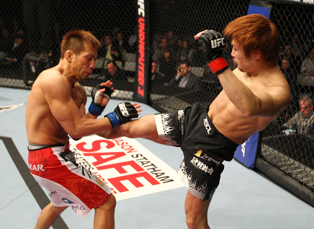 SAITAMA, JAPAN - FEBRUARY 26:  (R-L) Takanori Gomi kicks Eiji Mitsuoka during the UFC 144 event at Saitama Super Arena on February 26, 2012 in Saitama, Japan.  (Photo by Al Bello/Zuffa LLC/Zuffa LLC via Getty Images) *** Local Caption *** Takanori Gomi; Eiji Mitsuoka