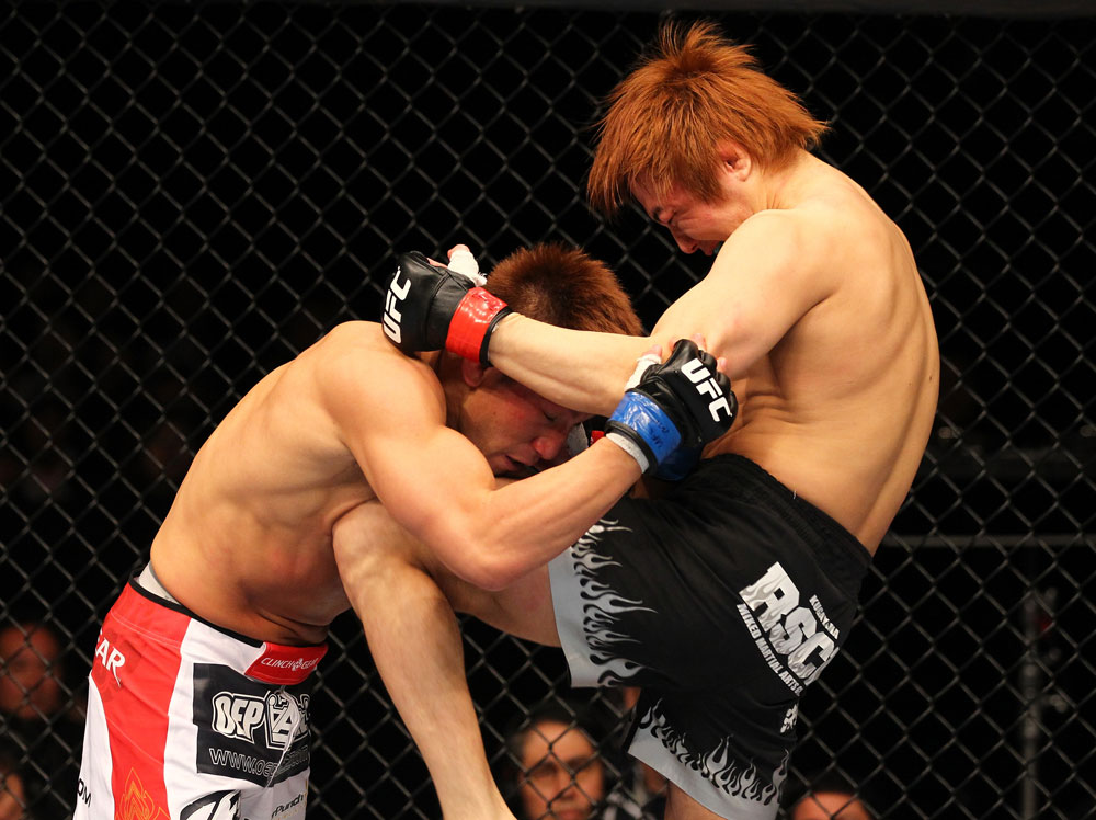 SAITAMA, JAPAN - FEBRUARY 26:  (R-L) Takanori Gomi delivers a knee strike against Eiji Mitsuoka during the UFC 144 event at Saitama Super Arena on February 26, 2012 in Saitama, Japan.  (Photo by Al Bello/Zuffa LLC/Zuffa LLC via Getty Images) *** Local Caption *** Takanori Gomi; Eiji Mitsuoka