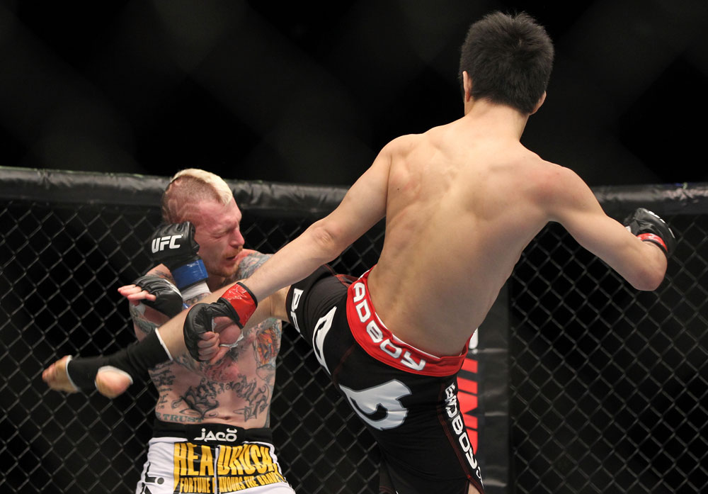 SAITAMA, JAPAN - FEBRUARY 26:  (R-L) Hatsu Hioki kicks Bart Palaszewski during the UFC 144 event at Saitama Super Arena on February 26, 2012 in Saitama, Japan.  (Photo by Josh Hedges/Zuffa LLC/Zuffa LLC via Getty Images) *** Local Caption *** Hatsu Hioki; Bart Palaszewski