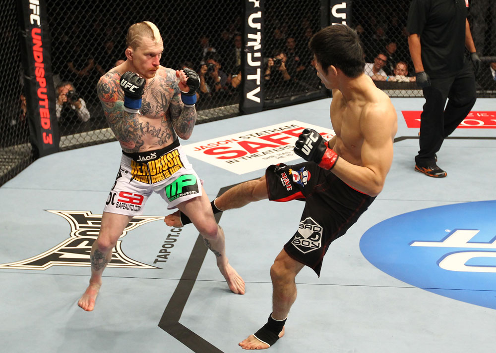 SAITAMA, JAPAN - FEBRUARY 26:  (R-L) Hatsu Hioki kicks Bart Palaszewski during the UFC 144 event at Saitama Super Arena on February 26, 2012 in Saitama, Japan.  (Photo by Al Bello/Zuffa LLC/Zuffa LLC via Getty Images) *** Local Caption *** Hatsu Hioki; Bart Palaszewski
