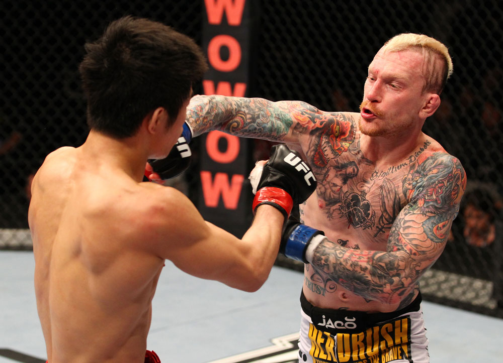 SAITAMA, JAPAN - FEBRUARY 26:  (R-L) Bart Palaszewski punches Hatsu Hioki during the UFC 144 event at Saitama Super Arena on February 26, 2012 in Saitama, Japan.  (Photo by Al Bello/Zuffa LLC/Zuffa LLC via Getty Images) *** Local Caption *** Hatsu Hioki; Bart Palaszewski