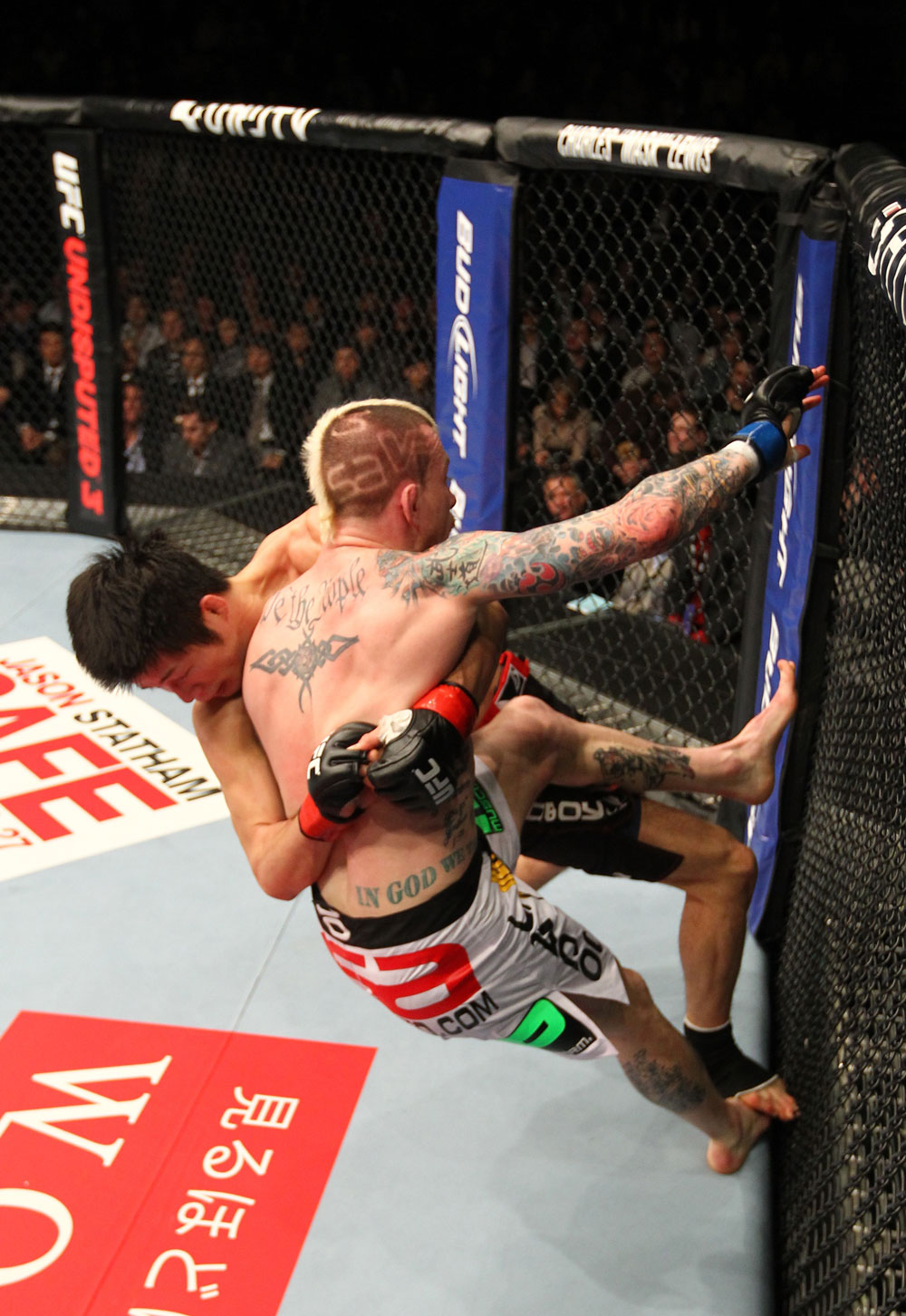 SAITAMA, JAPAN - FEBRUARY 26:  (L-R) Hatsu Hioki takes down Bart Palaszewski during the UFC 144 event at Saitama Super Arena on February 26, 2012 in Saitama, Japan.  (Photo by Al Bello/Zuffa LLC/Zuffa LLC via Getty Images) *** Local Caption *** Hatsu Hioki; Bart Palaszewski