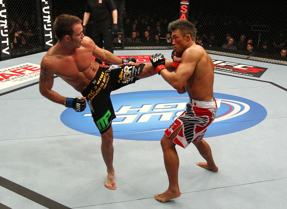 SAITAMA, JAPAN - FEBRUARY 26:  (L-R) Jake Shields kicks Yoshihiro Akiyama during the UFC 144 event at Saitama Super Arena on February 26, 2012 in Saitama, Japan.  (Photo by Al Bello/Zuffa LLC/Zuffa LLC via Getty Images) *** Local Caption *** Yoshihiro Akiyama; Jake Shields