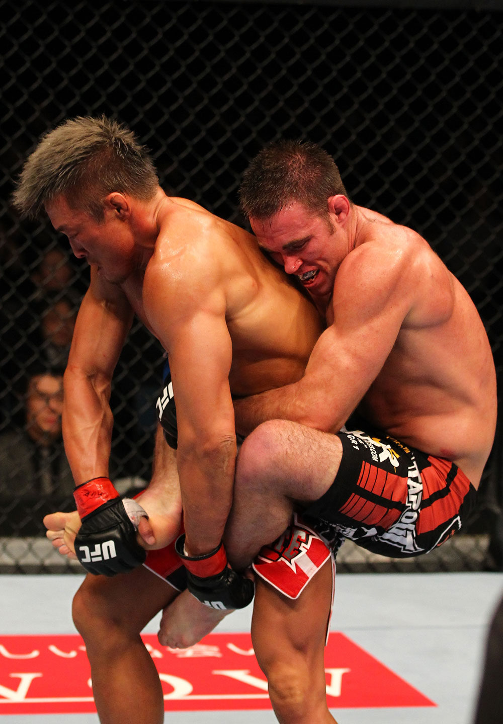 SAITAMA, JAPAN - FEBRUARY 26:  (R-L) Jake Shields attempts to take down Yoshihiro Akiyama during the UFC 144 event at Saitama Super Arena on February 26, 2012 in Saitama, Japan.  (Photo by Al Bello/Zuffa LLC/Zuffa LLC via Getty Images) *** Local Caption *** Yoshihiro Akiyama; Jake Shields