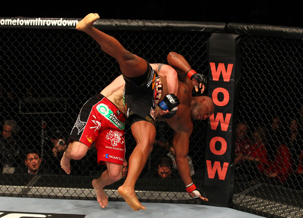 SAITAMA, JAPAN - FEBRUARY 26:  (L-R) Ryan Bader takes down Quinton "Rampage" Jackson during the UFC 144 event at Saitama Super Arena on February 26, 2012 in Saitama, Japan.  (Photo by Al Bello/Zuffa LLC/Zuffa LLC via Getty Images) *** Local Caption *** Quinton Jackson; Ryan Bader