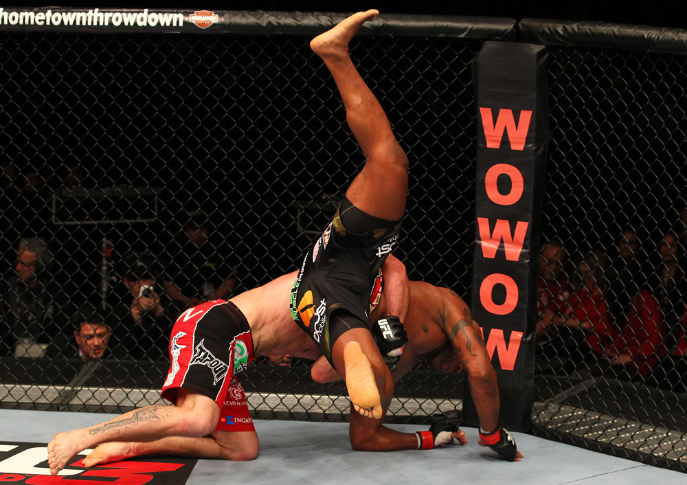 SAITAMA, JAPAN - FEBRUARY 26:  (L-R) Ryan Bader takes down Quinton "Rampage" Jackson during the UFC 144 event at Saitama Super Arena on February 26, 2012 in Saitama, Japan.  (Photo by Al Bello/Zuffa LLC/Zuffa LLC via Getty Images) *** Local Caption *** Quinton Jackson; Ryan Bader
